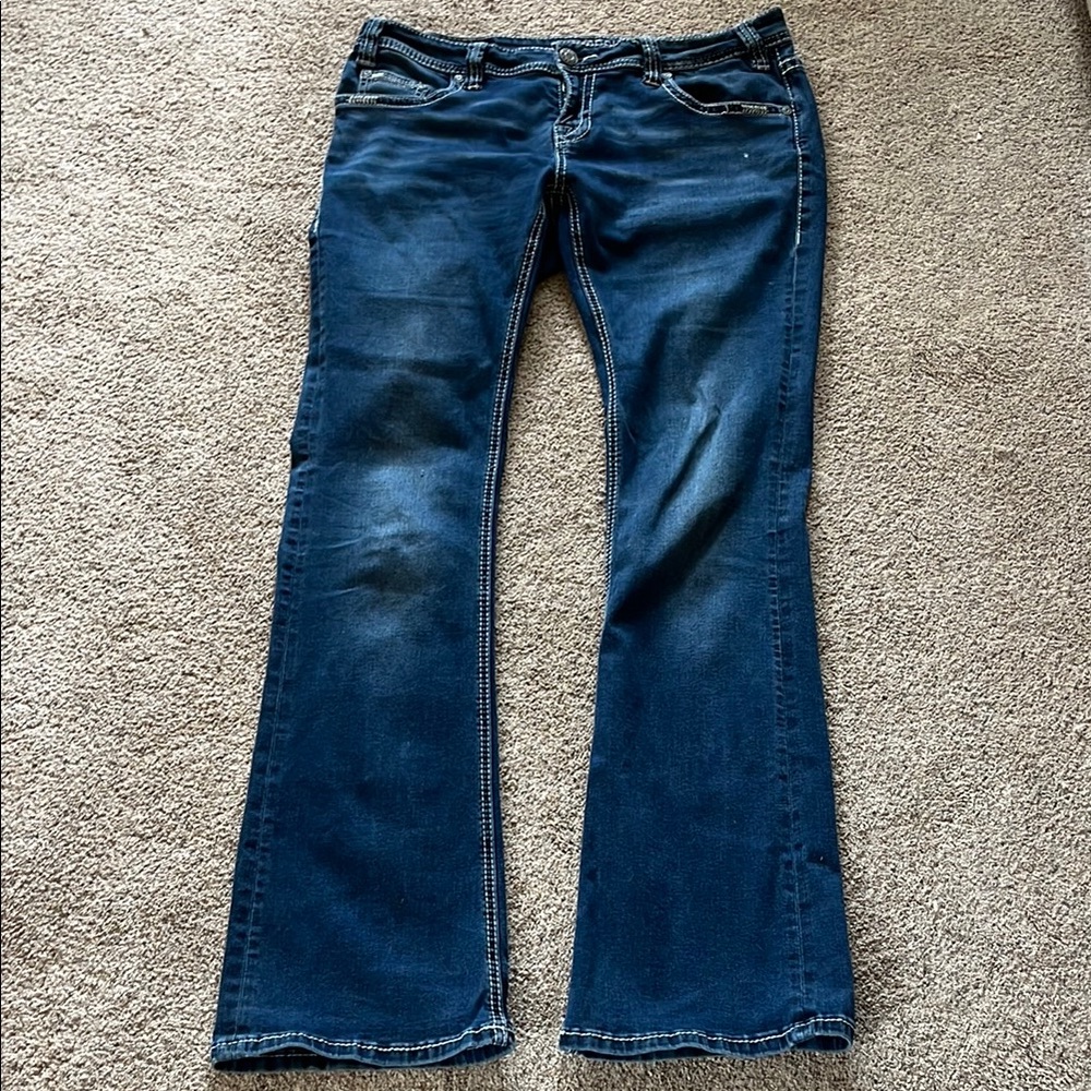 Women's Blue Jeans ROCK AND ROLL COWGIRL. Low rise boot cut. Size 32×34.